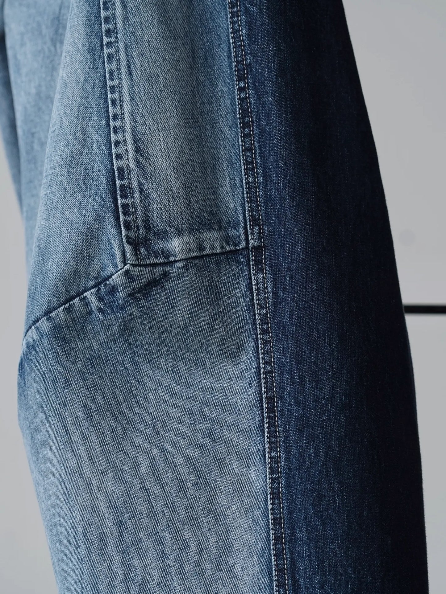 Nomàt | Two-tone Denim Curved Pants Sax Blue