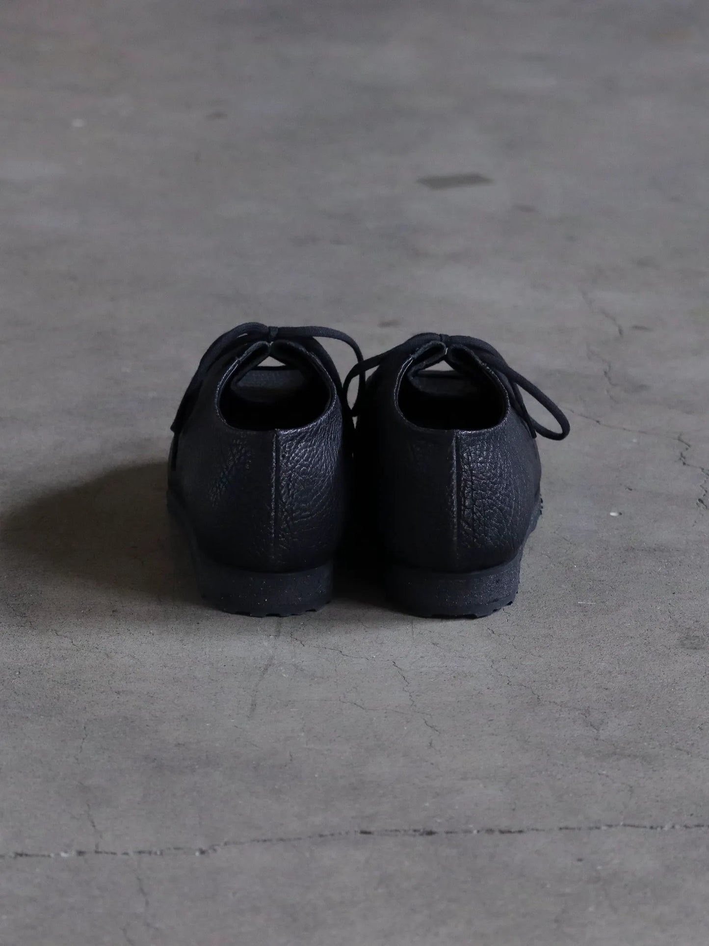 petrosolaum-drawstring-horse-oil-shrink-black-3