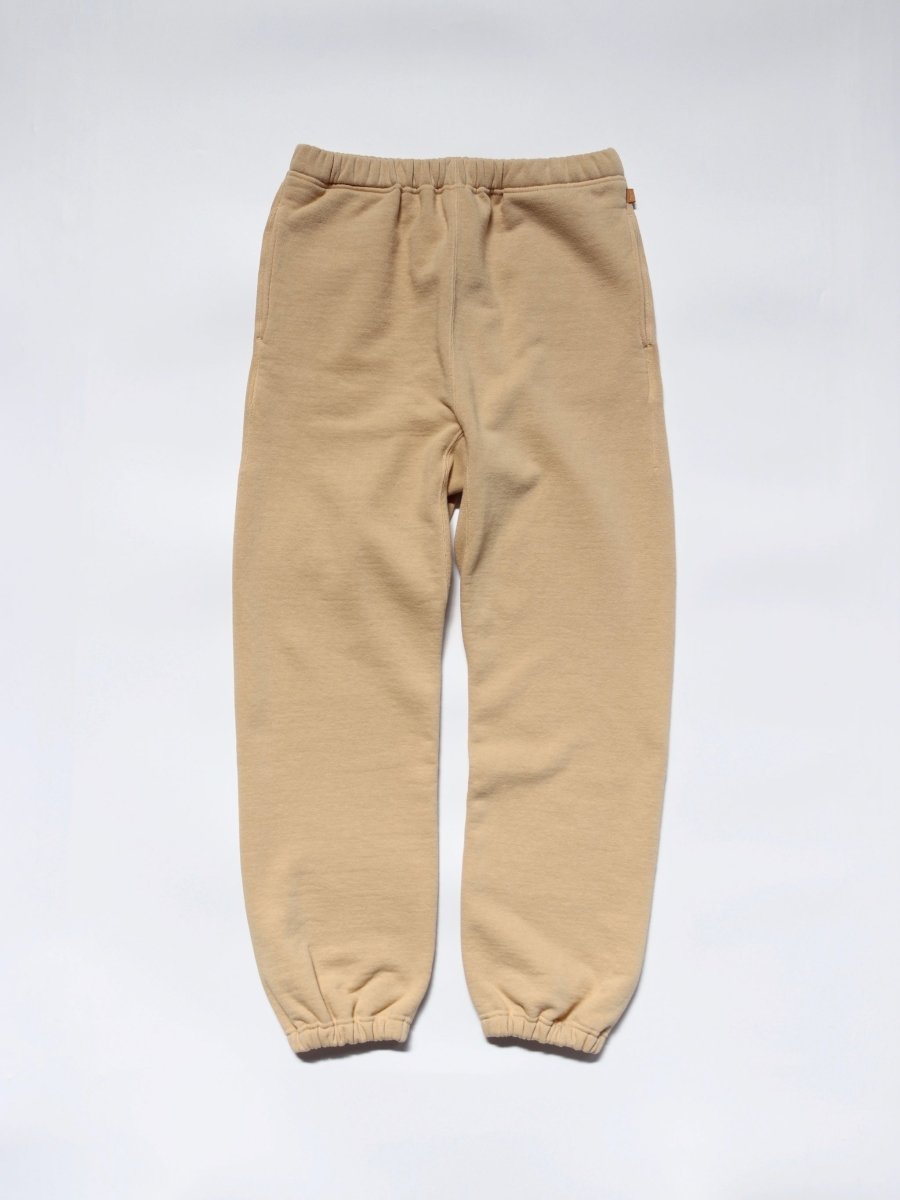 medium-sportswear-warmup-pants-cream-1