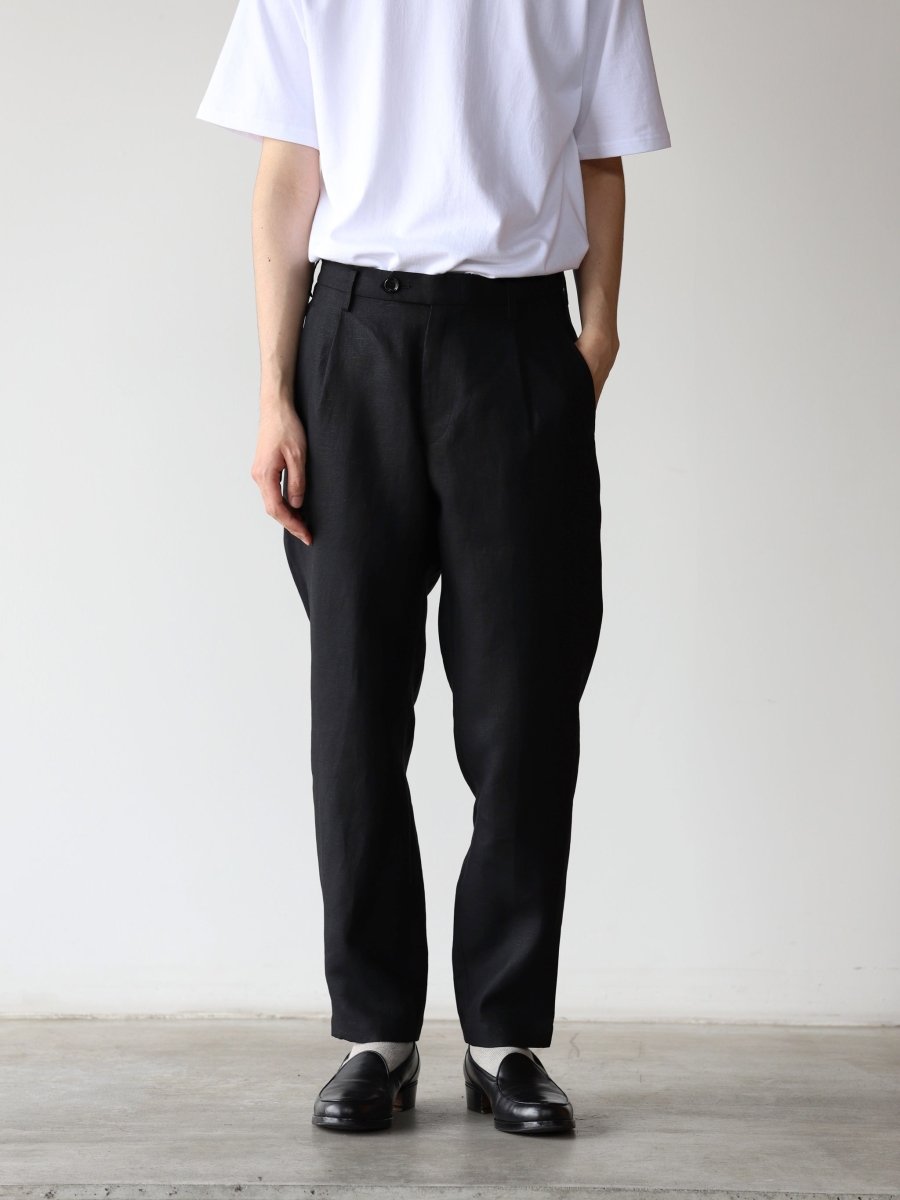 un-unbient-heavy-linen-tropical-one-tuck-trousers-black-1